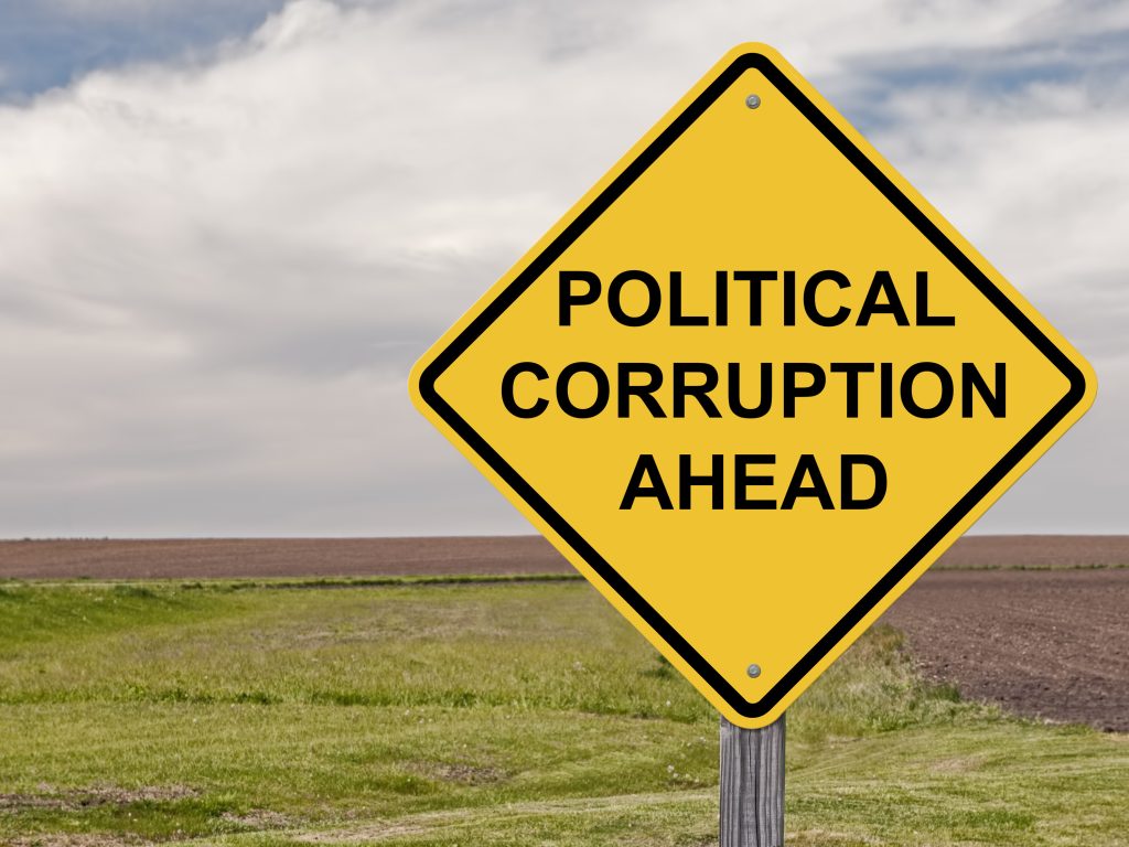 political corruption warning sign